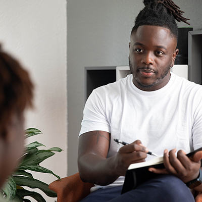 Counselor listening to a patient